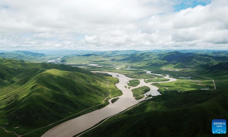 This aerial photo taken on June 23, 2019 shows a view of the Yellow River in Maqu County, Gannan Tibetan Autonomous Prefecture of northwest China's Gansu Province. This year's World Soil Day fell on Monday. Located on the northeast brink of the Qinghai-Tibet Plateau, Maqu County boasts an extensive presence of grasslands and wetlands, which had suffered a lot from degeneration and desertification before the end of the 20th century.(Photo: Xinhua)