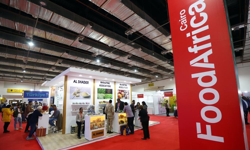 People visit the Food Africa exhibition in Cairo, Egypt, Dec. 5, 2022. Egypt's capital Cairo hosted on Monday an international exhibition for the agro-food industry in Africa with over 700 exhibitors from more than 30 countries.(Photo: Xinhua)