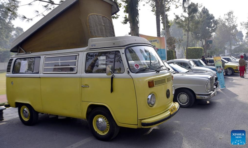 People visit the Vintage and Classic car show in northwest Pakistan's Peshawar on Dec. 4, 2022.(Photo: Xinhua)