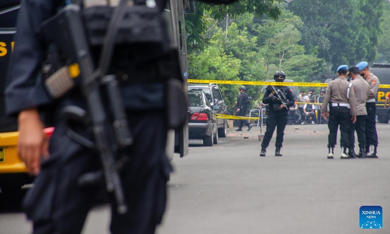 Police officers stand guard near the police station hit by suicide bombing in Bandung, Indonesia, Dec. 7, 2022. Two people were killed and nine others injured after a suicide bombing occurred at a police station in Bandung city, the capital of Indonesia's West Java province, on Wednesday morning, police said.(Photo: Xinhua)