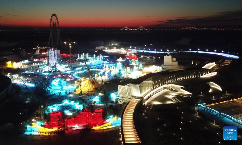 This aerial photo taken on Dec. 7, 2022 shows workers working at the construction site of the Harbin Ice-Snow World, a renowned seasonal theme park opening every winter, in Harbin, northeast China's Heilongjiang Province.(Photo: Xinhua)