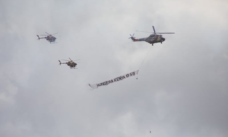 A Kenya Air Force plane with a banner with the words Hongera Kenya (congratulations Kenya) on it is pictured during Kenya's 59th Jamhuri Day (Independence Day) celebration at Nyayo National Stadium in Nairobi, capital of Kenya, Dec. 12, 2022.(Photo: Xinhua)