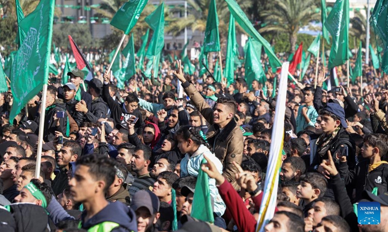 People attend a rally marking the 35th anniversary of the establishment of Hamas in Gaza City, on Dec. 14, 2022. A senior Hamas leader on Wednesday threatened to permanently end the prisoner exchange talks with Israel in response to the latter's continuous delay in them.(Photo: Xinhua)