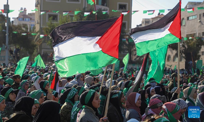 People attend a rally marking the 35th anniversary of the establishment of Hamas in Gaza City, on Dec. 14, 2022. A senior Hamas leader on Wednesday threatened to permanently end the prisoner exchange talks with Israel in response to the latter's continuous delay in them.(Photo: Xinhua)