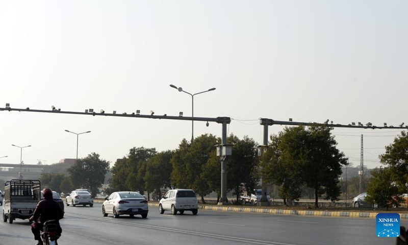 This photo taken on Dec. 19, 2022 shows vehicles running on a highway equipped with surveillance cameras in Islamabad, Pakistan. Nearly 200 high-tech surveillance cameras have been installed at the entry and exit points of Pakistan's Islamabad to further beef up the security and make surveillance more potent, an official said on Monday.(Photo: Xinhua)