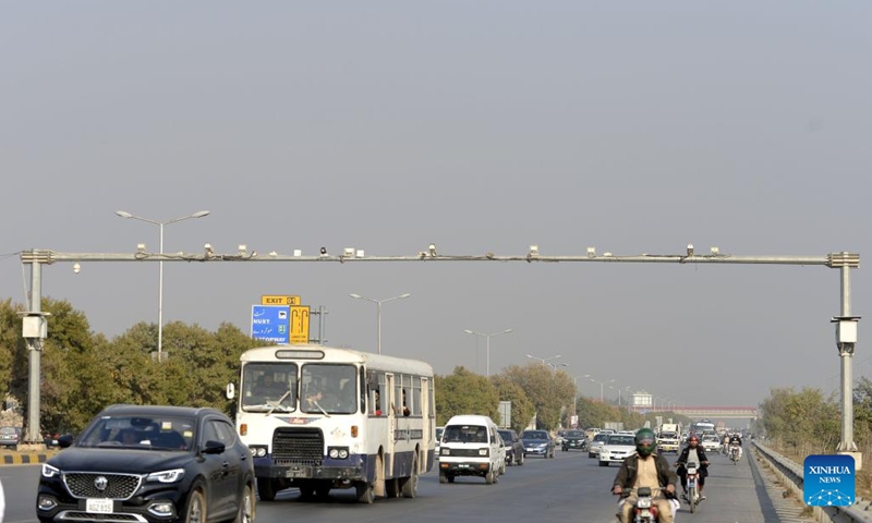 This photo taken on Dec. 19, 2022 shows vehicles running on a highway equipped with surveillance cameras in Islamabad, Pakistan. Nearly 200 high-tech surveillance cameras have been installed at the entry and exit points of Pakistan's Islamabad to further beef up the security and make surveillance more potent, an official said on Monday.(Photo: Xinhua)