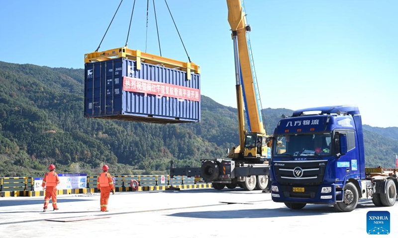 A staff member lifts a container with a crane at a wharf of Nanping Port in southeast China's Fujian Province on Dec. 18, 2022.

The main stream of Minjiang River reopened to navigation on Sunday. Navigation in the river's main stream had been suspended for years due to changes in water level and hydrogeological conditions. (Xinhua/Lin Shanchuan)