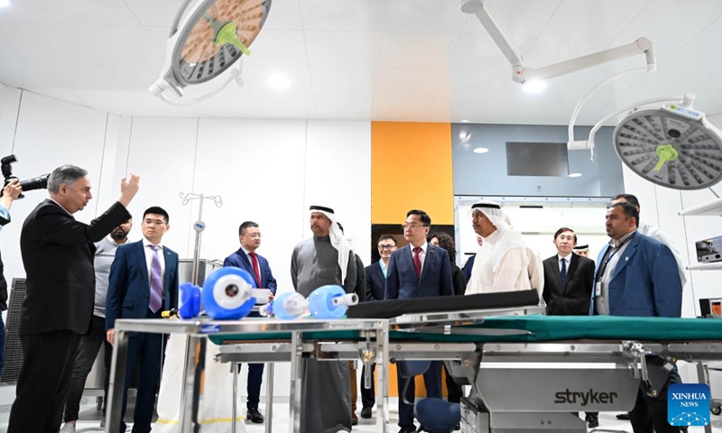 Guests visit the Kuwait Health Assurance Hospital after its soft opening ceremony in Ahmadi, Kuwait, Dec. 18, 2022. The soft opening ceremony of a hospital built by a Chinese company was held in Ahmadi, Kuwait, on Sunday.(Photo: Xinhua)