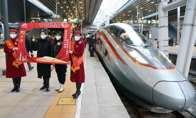 A bullet train stops at the platform of Beijing West Railway Station in Beijing, capital of China, Dec. 26, 2022. A total of 1.69 billion passenger trips have been made on the Beijing-Guangzhou high-speed railway since it went into operation ten years ago, official data showed. As the backbone of the high-speed rail network in China, the 2,298-km Beijing-Guangzhou high-speed railway is closely connected with 12 other high-speed railways in the country. (Photo: Xinhua)