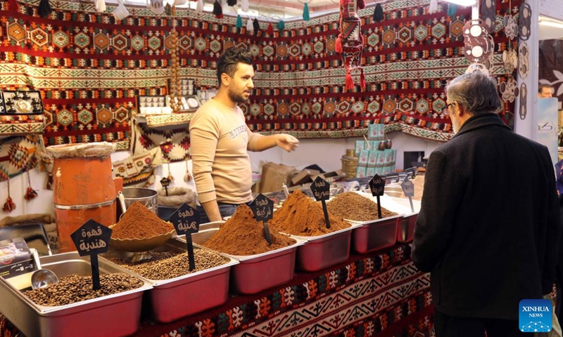 People attend the Made in Syria exhibition at the Baghdad International Fair in Baghdad, Iraq, on Dec. 28, 2022.(Photo: Xinhua)