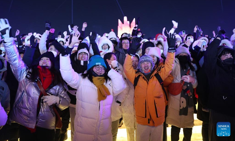 Tourists visit the Harbin Ice-Snow World in Harbin, northeast China's Heilongjiang Province, Dec. 31, 2022. (Xinhua/Zhang Tao)