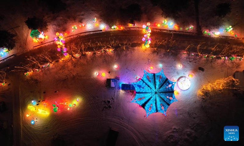 This aerial photo taken on Dec. 31, 2022 shows a view of a lantern show in Shenyang, northeast China's Liaoning Province. A lantern show to greet the upcoming Spring Festival kicked off here on Dec. 30, 2022. Covering an area of more than 20,000 square meters, the lantern show, with more than 70 sets of large lighting installations illuminating the city's night sky, has become an attraction to visitors. (Xinhua/Yang Qing)