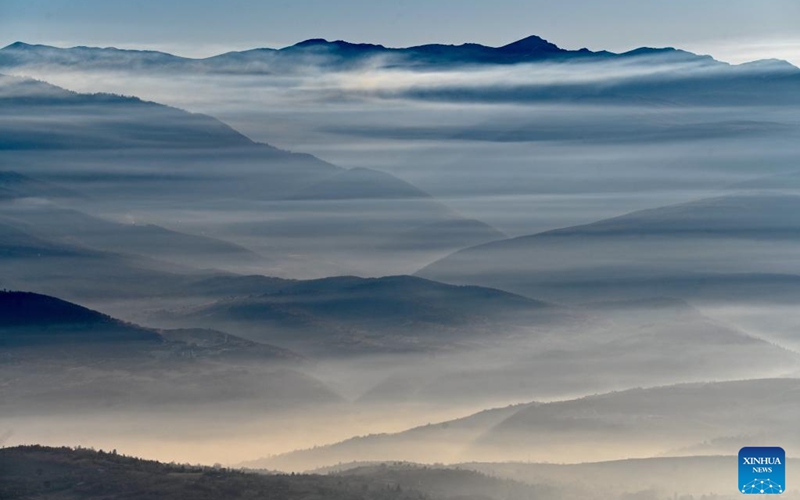 This photo taken on Jan. 2, 2023 shows a mist-shrouded valley in Skopje, North Macedonia. (Photo by Tomislav Georgiev/Xinhua)