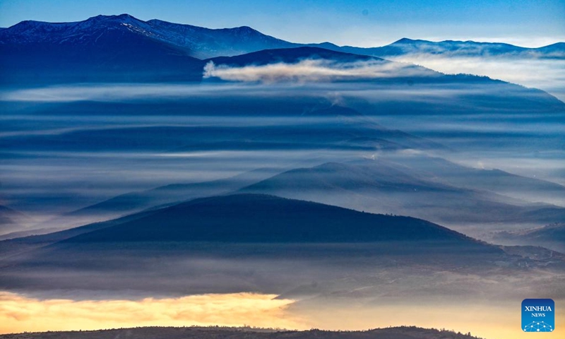 This photo taken on Jan. 2, 2023 shows a mist-shrouded valley in Skopje, North Macedonia. (Photo by Tomislav Georgiev/Xinhua)