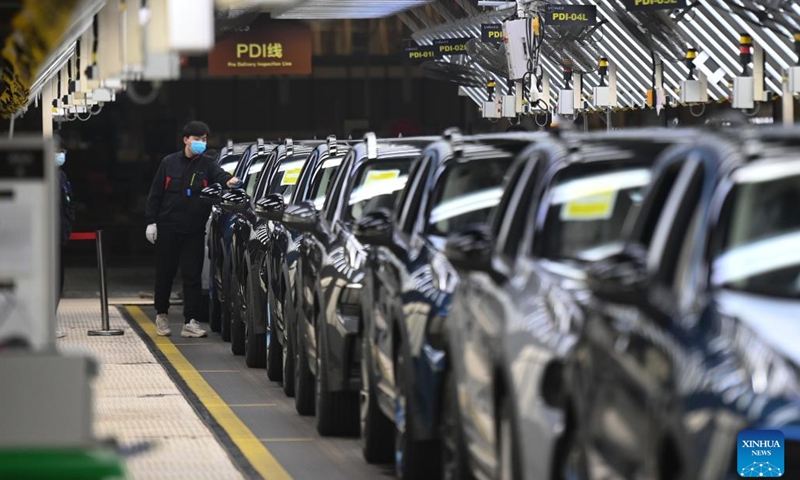 An employee works at an automobile company in Yuyao, east China's Zhejiang Province, Jan. 5, 2023. With production lines humming and machines running in full swing, factories across China have resumed busy operations after the country's latest optimization of COVID-19 response and a series of measures to accelerate production resumption.(Photo: Xinhua)