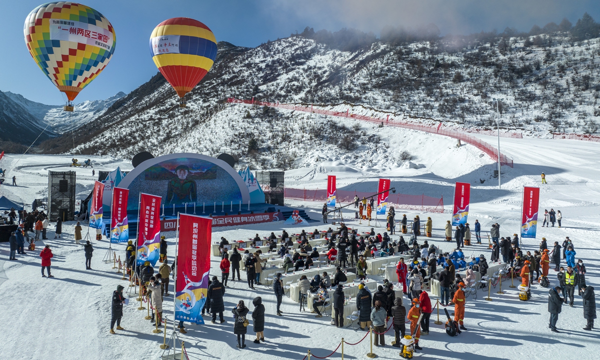 People on January 4, 2023 participate in a snow and ice festival, which was launched at a ski resort in Lixian county, Southwest China's Sichuan Province. Photo: VCG