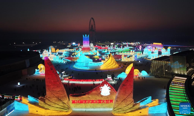 This aerial photo taken on Jan. 5, 2023 shows tourists visiting the Harbin Ice-Snow World theme park in Harbin, northeast China's Heilongjiang Province. The opening ceremony of the 39th Harbin International Ice and Snow Festival was held on Thursday.(Photo: Xinhua)