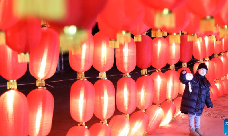 Tourists view lanterns at Liaohe ancient street in Yingkou, northeast China's Liaoning Province, Feb. 3, 2023. The Liaohe ancient street has been decorated with various lanterns to greet the Lantern Festival, the 15th day of the first month of the Chinese lunar calendar, which falls on Feb. 5 this year. Photo: Xinhua