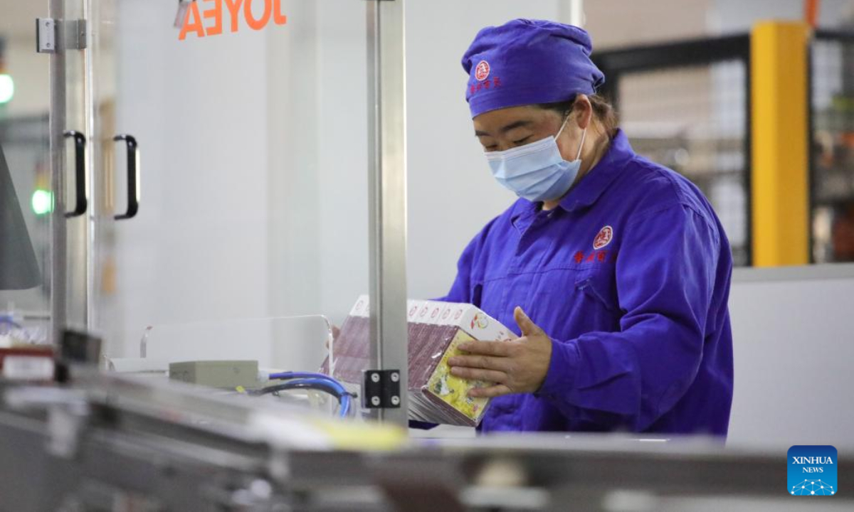 A worker works at a pharmaceutical company in Anshun City, southwest China's Guizhou Province, Jan 6, 2023. Pharmaceutical production lines in Anshun are running at full capacity, increasing the market supply of medicine. Photo:Xinhua