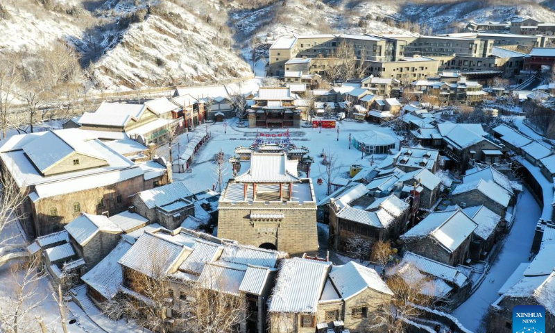 This aerial photo taken on Feb. 19, 2023 shows snow scenery of the Gubei Water Town in Beijing, capital of China. Photo: Xinhua