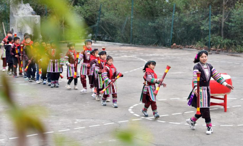 Students practice traditional dance of Yao ethnic group at the Zhongzhai education spot in Xishan Town of Congjiang County, Qiandongnan Miao and Dong Autonomous Prefecture, southwest China's Guizhou Province, Feb. 16, 2023. Zhongzhai education spot, located in the remote mountainous area of Guizhou Province, has only one teacher and 16 students of Yao ethnic group. In recent years, the conditions of this mini primary school have been greatly improved with the help of local government and community. Photo: Xinhua