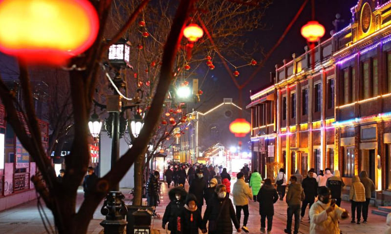 Tourists view lanterns at Liaohe ancient street in Yingkou, northeast China's Liaoning Province, Feb. 3, 2023. The Liaohe ancient street has been decorated with various lanterns to greet the Lantern Festival, the 15th day of the first month of the Chinese lunar calendar, which falls on Feb. 5 this year. Photo: Xinhua