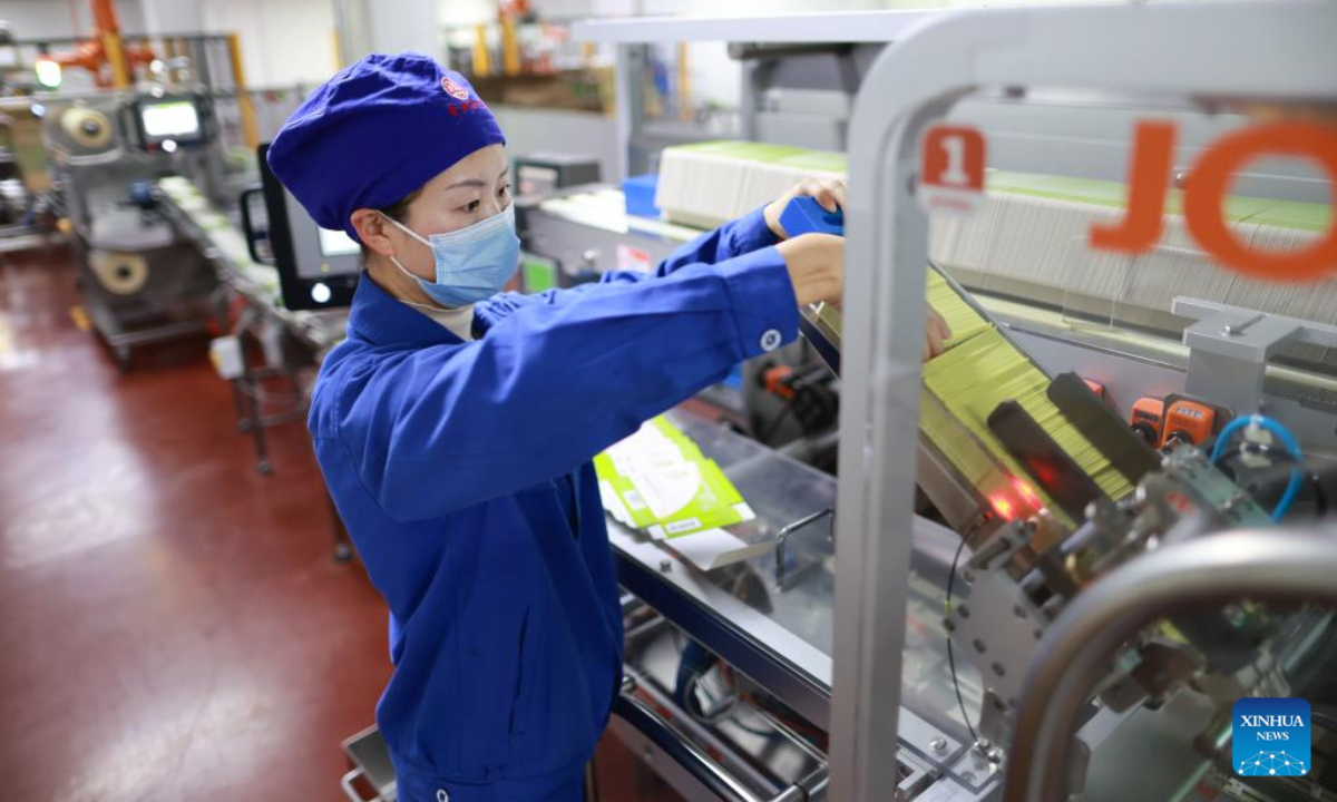 A worker works at a pharmaceutical company in Anshun City, southwest China's Guizhou Province, Jan 6, 2023. Pharmaceutical production lines in Anshun are running at full capacity, increasing the market supply of medicine. Photo:Xinhua