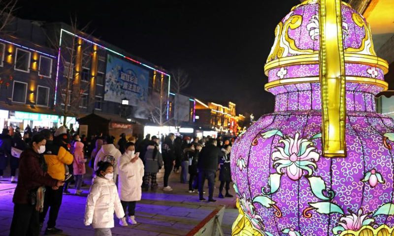 Tourists view lanterns at Liaohe ancient street in Yingkou, northeast China's Liaoning Province, Feb. 3, 2023. The Liaohe ancient street has been decorated with various lanterns to greet the Lantern Festival, the 15th day of the first month of the Chinese lunar calendar, which falls on Feb. 5 this year. Photo: Xinhua