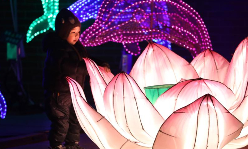 Tourists view lanterns at Liaohe ancient street in Yingkou, northeast China's Liaoning Province, Feb. 3, 2023. The Liaohe ancient street has been decorated with various lanterns to greet the Lantern Festival, the 15th day of the first month of the Chinese lunar calendar, which falls on Feb. 5 this year. Photo: Xinhua