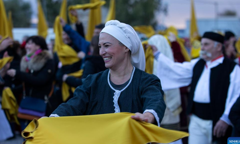 A woman in traditional costume dances in Elefsina, Greece, Feb. 4, 2023. The opening ceremony of 2023 Eleusis European Capital of Culture was held on Saturday in Elefsina, some 20 km west of Athens. Photo: Xinhua