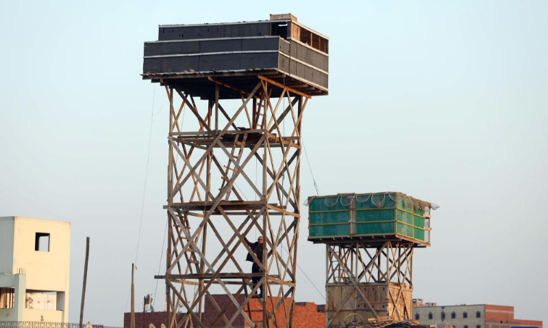 Pigeon lofts are seen on top of buildings in Cairo, Egypt, Jan. 29, 2023. Photo: Xinhua