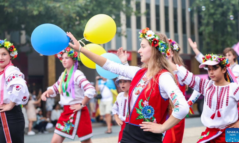 Performers take part in the 2023 National Multicultural Festival in Canberra, Australia, Feb. 18, 2023. The festival, held from Feb. 17 to 19 in Canberra, provides a stage for various cultures and attracts visitors with music, dance performances and delicious food. Photo: Xinhua