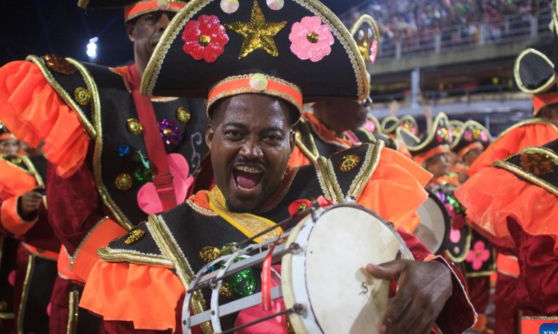 A reveler participates in the carnival parade at the Sambadrome in Rio de Janeiro, Brazil, on Feb. 17, 2023. The Brazilian city's carnival is the South American country's biggest popular festival and one of the largest carnival celebrations in the world. Photo: Xinhua