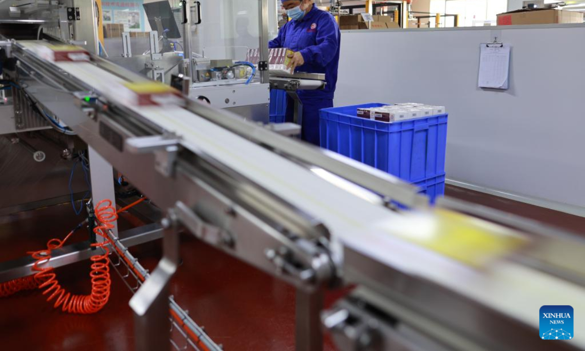 A worker works at a pharmaceutical company in Anshun City, southwest China's Guizhou Province, Jan 6, 2023. Pharmaceutical production lines in Anshun are running at full capacity, increasing the market supply of medicine. Photo:Xinhua