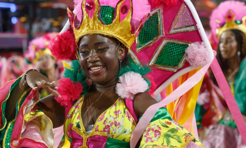 A reveler participates in the carnival parade at the Sambadrome in Rio de Janeiro, Brazil, on Feb. 17, 2023. The Brazilian city's carnival is the South American country's biggest popular festival and one of the largest carnival celebrations in the world. Photo: Xinhua