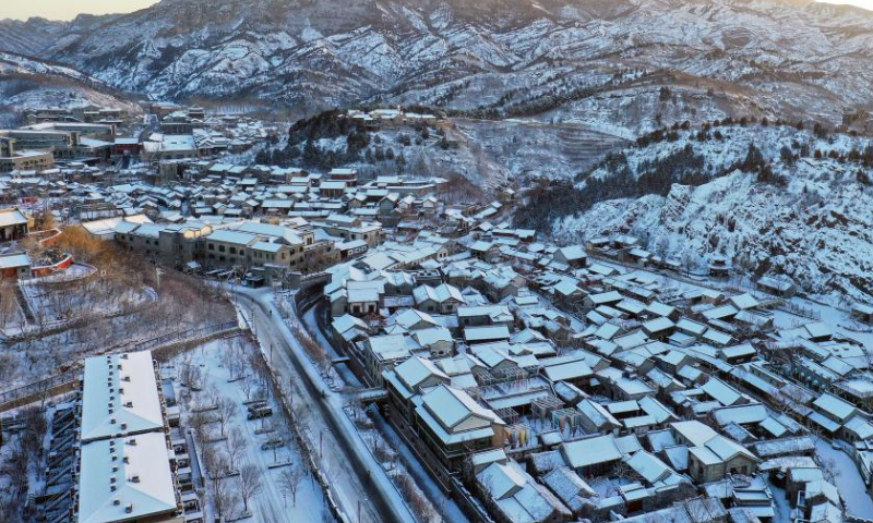 This aerial photo taken on Feb. 19, 2023 shows snow scenery of the Gubei Water Town in Beijing, capital of China. Photo: Xinhua