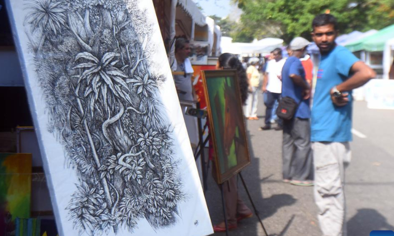 People visit the Kala Pola, an annual open-air art exhibition, in Colombo, Sri Lanka, Feb. 19, 2023. Photo: Xinhua