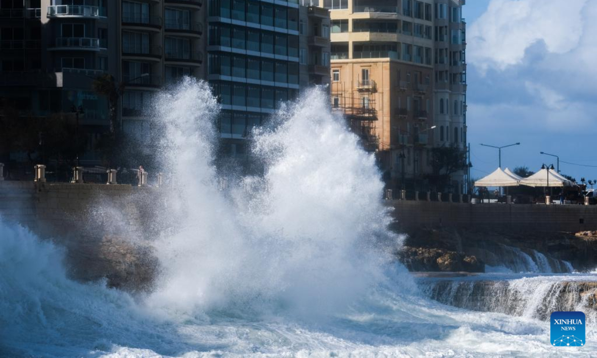 High waves pound the coast in Sliema, Malta, on Feb 10, 2023. High winds and waves caused damage across Malta, including several historic sites, as storm Helios battered the island on Thursday and Friday. Photo:Xinhua
