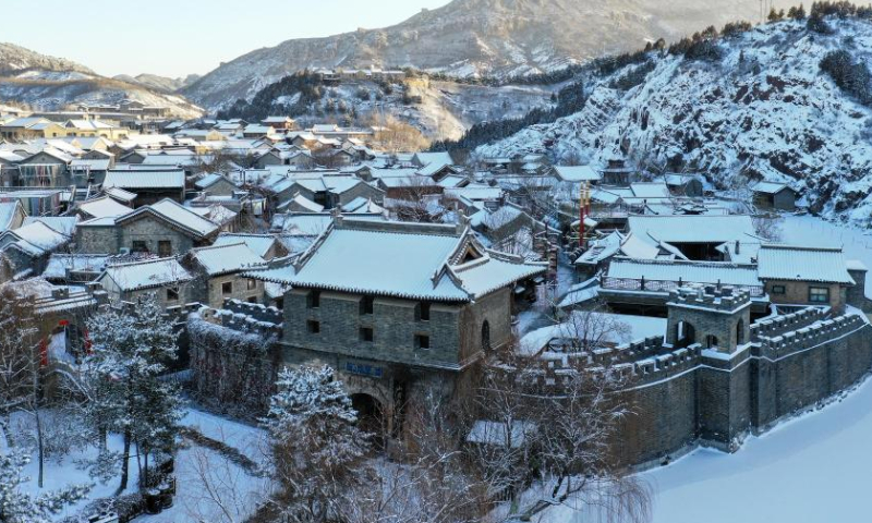 This aerial photo taken on Feb. 19, 2023 shows snow scenery of the Gubei Water Town in Beijing, capital of China. Photo: Xinhua