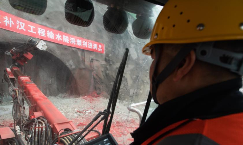 A worker operates a machine at the construction site of an underground water-transfer tunnel in Danjiangkou, central China's Hubei Province, Feb. 18, 2023. Started construction on Saturday, the tunnel is the main part of a project to channel water from the Three Gorges Reservoir area to the Hanjiang River, a tributary of the Yangtze River. Photo: Xinhua