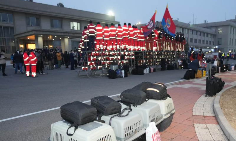 Members of rescue teams dispatched by the Chinese mainland and Hong Kong Special Administrative Region arrive in Beijing, capital of China, Feb. 17, 2023. Rescue teams dispatched by the Chinese mainland and Hong Kong Special Administrative Region returned to Beijing on a chartered plane Friday afternoon, after completing their rescue missions in Türkiye, according to the Ministry of Emergency Management. Photo: Xinhua