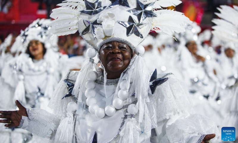 A reveler participates in the carnival parade at the Sambadrome in Rio de Janeiro, Brazil, on Feb. 17, 2023. The Brazilian city's carnival is the South American country's biggest popular festival and one of the largest carnival celebrations in the world. Photo: Xinhua