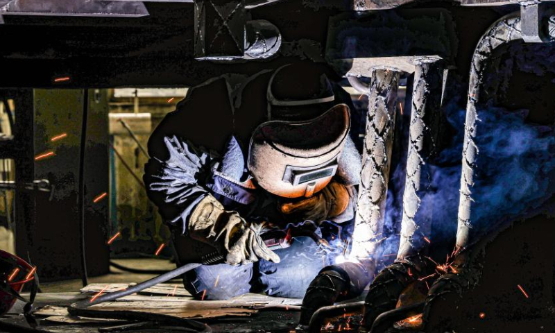 A worker conducts welding at a workshop of Northern Heavy Industries Group Co., Ltd. in Shenyang, northeast China's Liaoning Province, Jan. 13, 2023. Photo: Xinhua