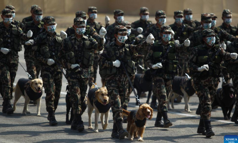 Nepali soldiers take part in a drill during an Army Day celebration in Kathmandu, Nepal, Feb. 18, 2023. Photo: Xinhua