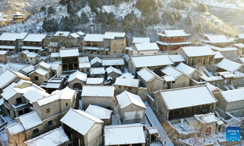 This aerial photo taken on Feb. 19, 2023 shows snow scenery of the Gubei Water Town in Beijing, capital of China. Photo: Xinhua