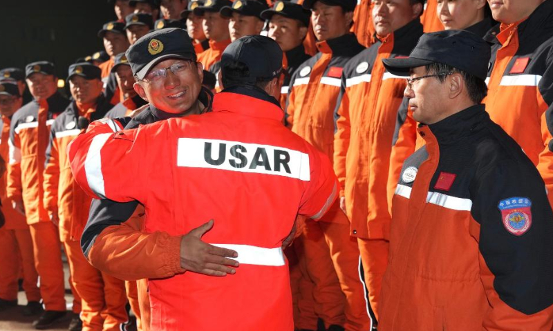 Members of rescue teams dispatched by the Chinese mainland and Hong Kong Special Administrative Region arrive in Beijing, capital of China, Feb. 17, 2023. Rescue teams dispatched by the Chinese mainland and Hong Kong Special Administrative Region returned to Beijing on a chartered plane Friday afternoon, after completing their rescue missions in Türkiye, according to the Ministry of Emergency Management. Photo: Xinhua