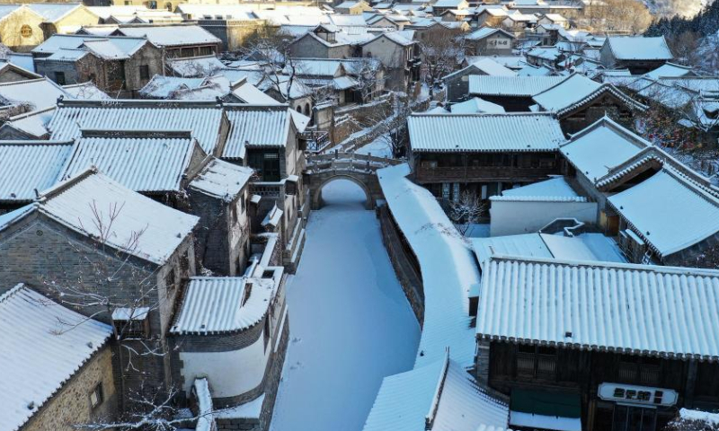 This aerial photo taken on Feb. 19, 2023 shows snow scenery of the Gubei Water Town in Beijing, capital of China. Photo: Xinhua