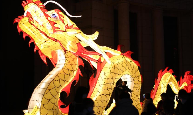 Tourists view lanterns at Liaohe ancient street in Yingkou, northeast China's Liaoning Province, Feb. 3, 2023. The Liaohe ancient street has been decorated with various lanterns to greet the Lantern Festival, the 15th day of the first month of the Chinese lunar calendar, which falls on Feb. 5 this year. Photo: Xinhua