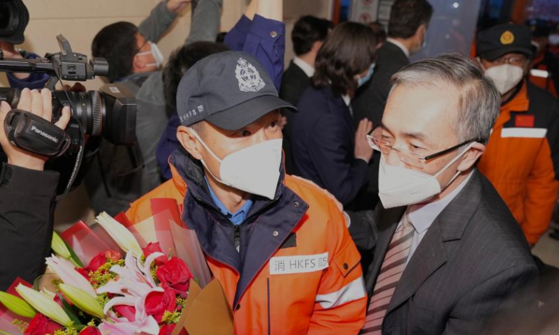 Members of rescue teams dispatched by the Chinese mainland and Hong Kong Special Administrative Region arrive in Beijing, capital of China, Feb. 17, 2023. Rescue teams dispatched by the Chinese mainland and Hong Kong Special Administrative Region returned to Beijing on a chartered plane Friday afternoon, after completing their rescue missions in Türkiye, according to the Ministry of Emergency Management. Photo: Xinhua