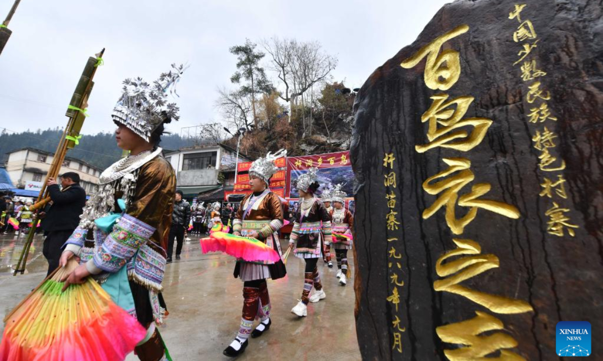 People of Miao ethnic group take part in the 